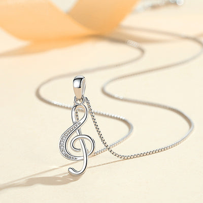 Collier avec pendentif en forme de note de musique au design spécial