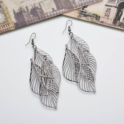 Boucles d’oreilles multicouches en métal à feuilles creuses