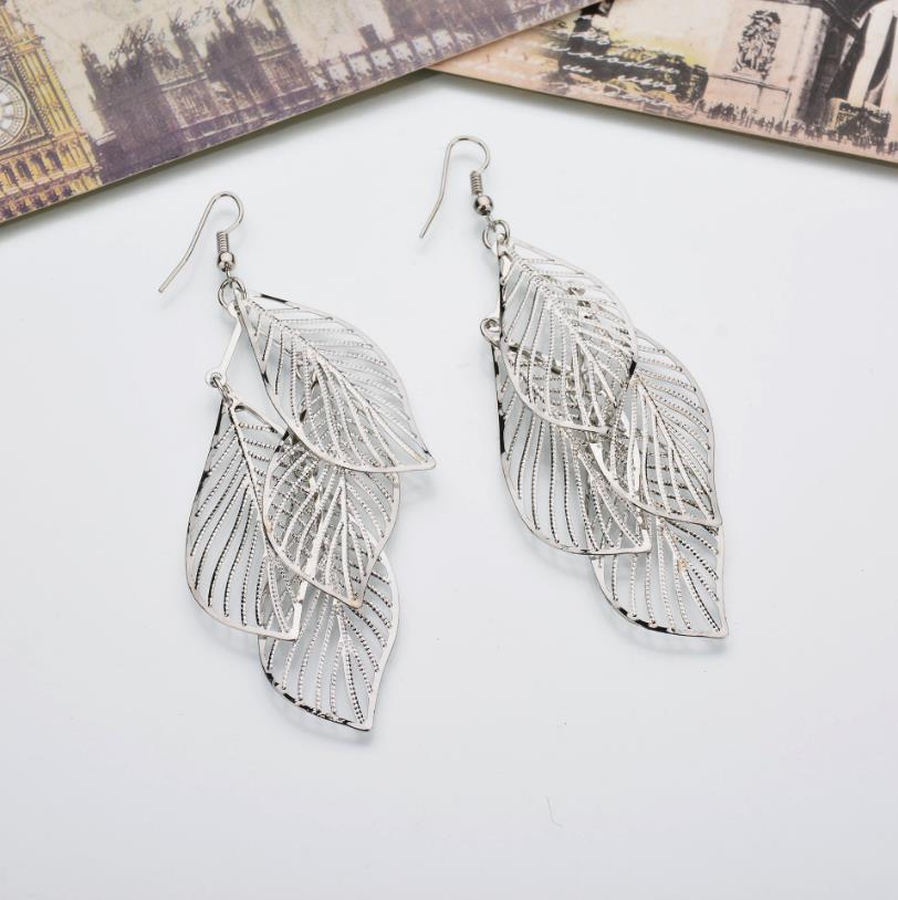 Boucles d’oreilles multicouches en métal à feuilles creuses