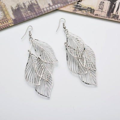 Boucles d’oreilles multicouches en métal à feuilles creuses