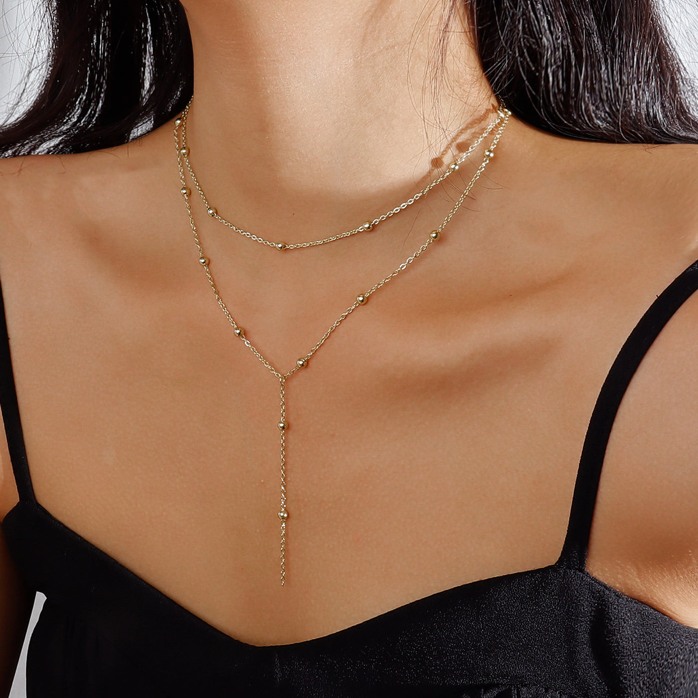 Collier simple à pompons multicouches en perles de riz