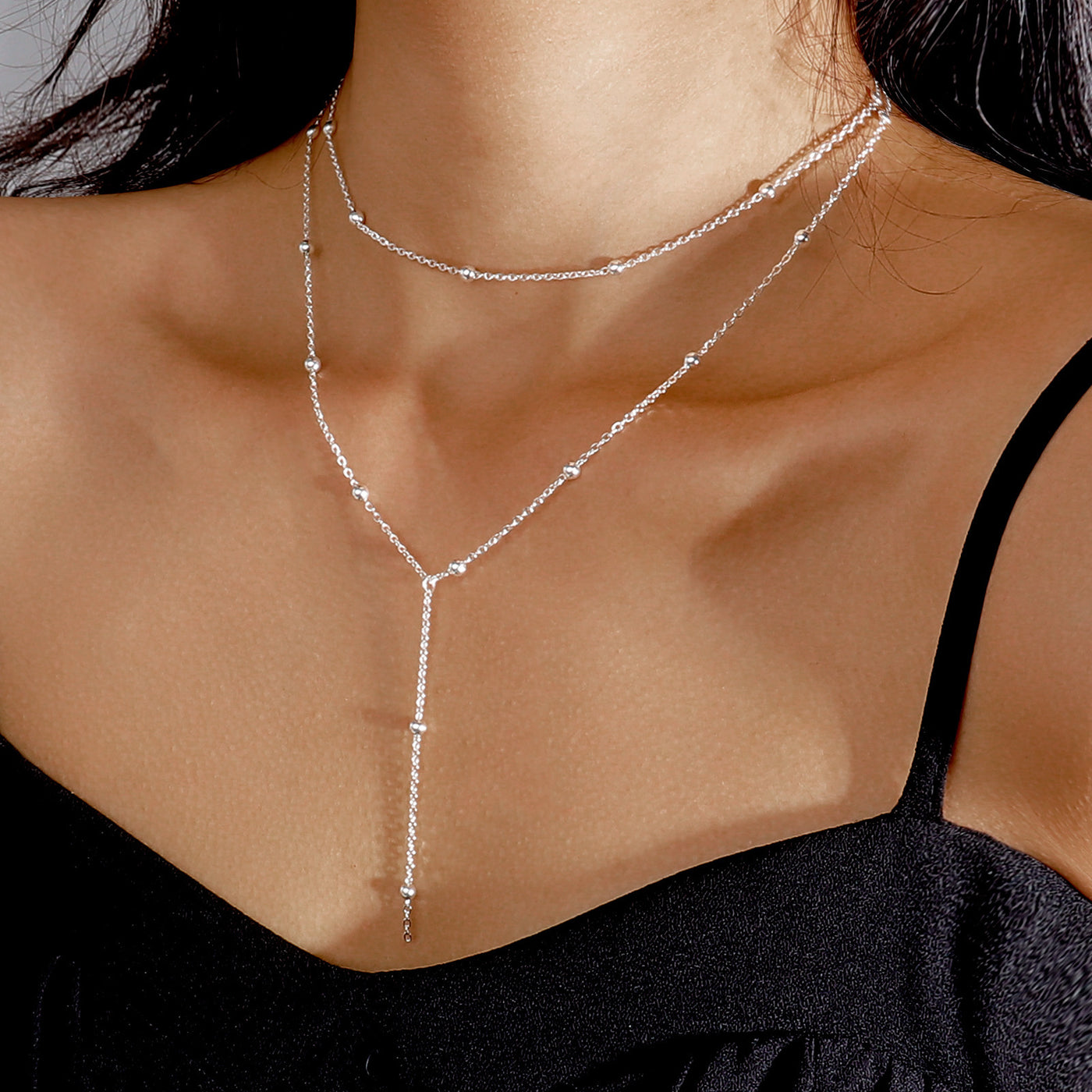 Collier simple à pompons multicouches en perles de riz
